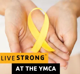 hands holding a yellow ribbon, which symbolizes cancer awareness. The text reads, "Livestrong at the YMCA."